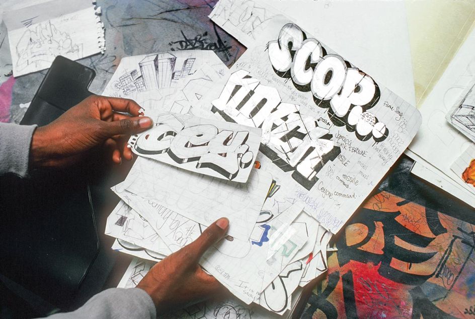 CEY with his sketches at Graphiti Productions Inc. Gallery, 1982