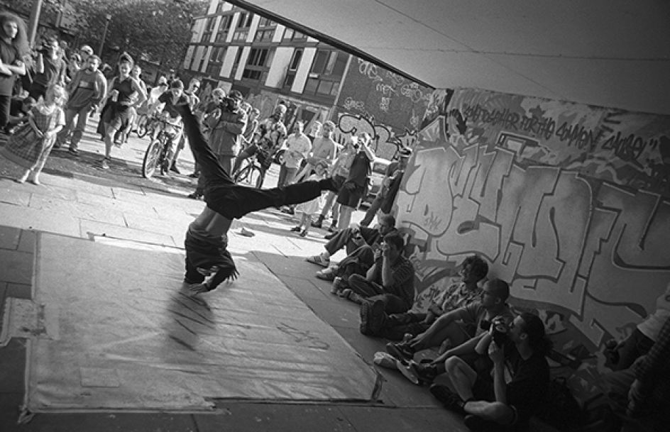 B.boy Evo dancing at the Smear II event, Hulme 1996 - Photograph by Al Baker