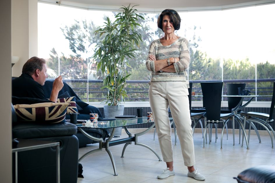 Reggie works at an English language newspaper that her husband owns. She likes the Spanish pace of life but has not learnt to speak the language and thus struggles to integrate with locals.