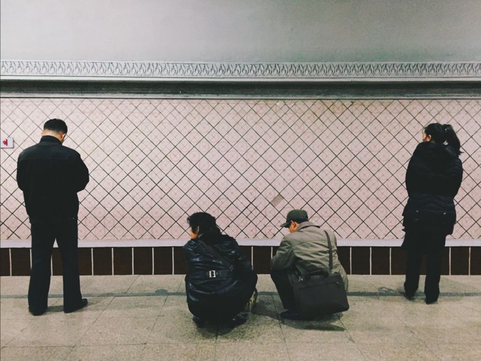 A very typical position that North Koreans took everywhere throughout the country.