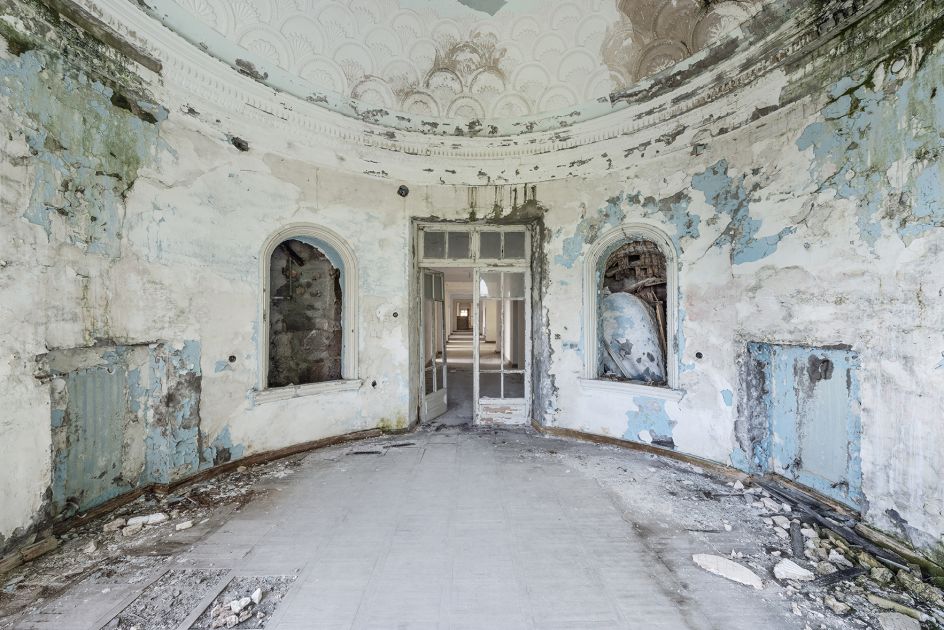 Past grandeur: the view inside an ornate room where patients with respiratory problems were treated. Many of the ex-Soviet sanatoria all featured light blue paints, benefiting to a very refined and typical style. Gagra, Abkhazia. © Reginald Van de Velde