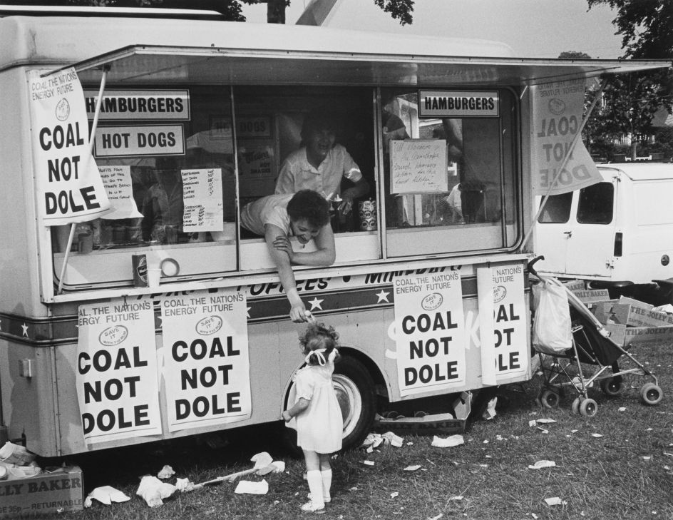 Buying an ice cream at Yorkshire Miners’ Gala. June 1984 © Brenda Prince