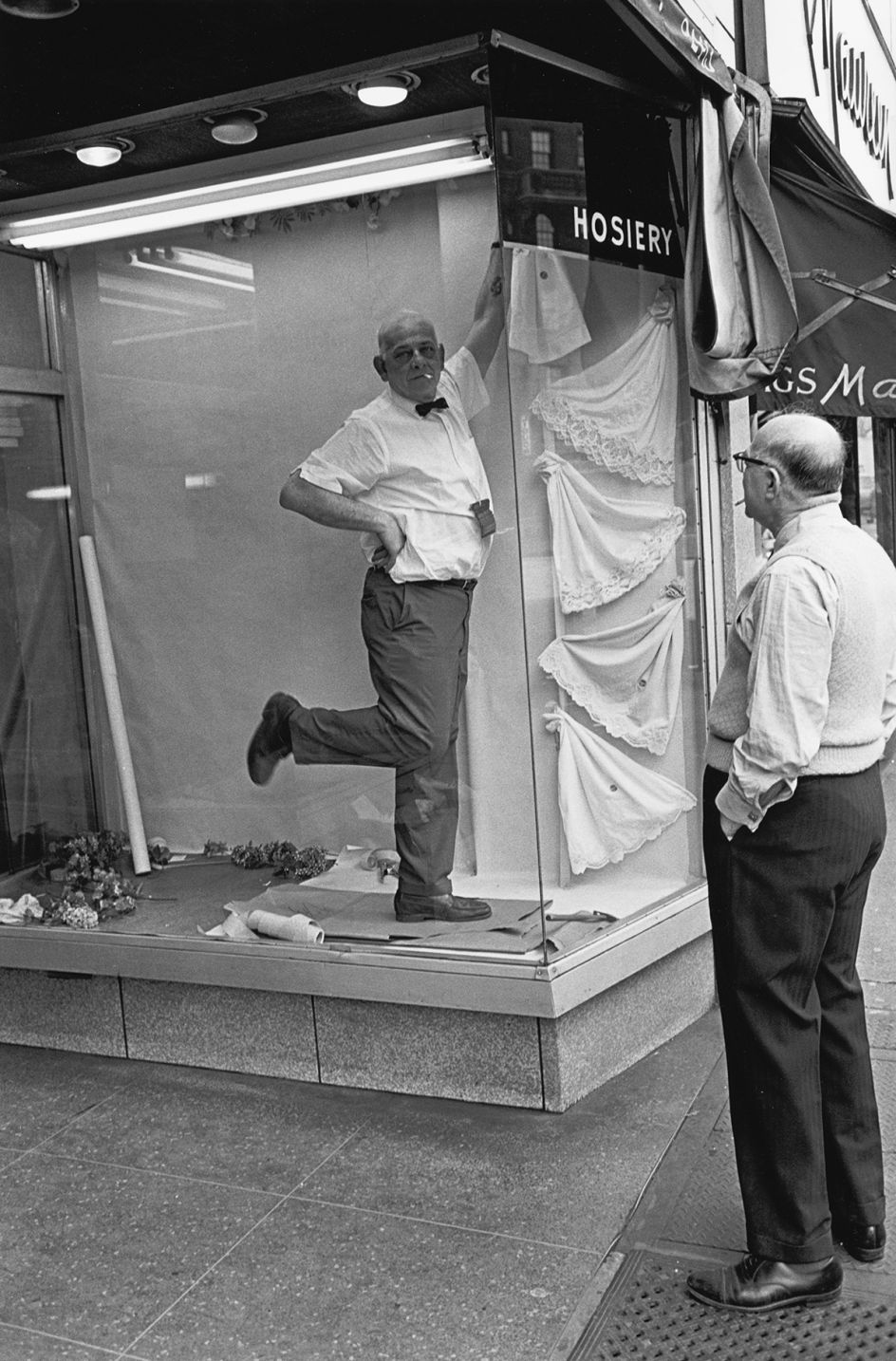 Window dresser striking a pose, 1960s
