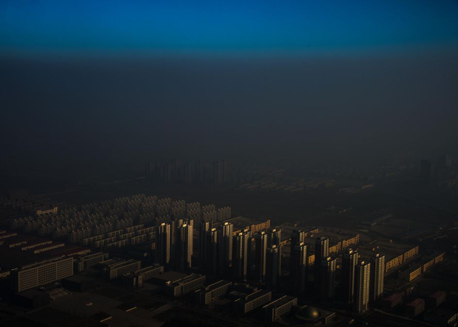 Contemporary Issues, first prize singles: A city in northern China shrouded in haze, Tianjin, China. Zhang Lei.