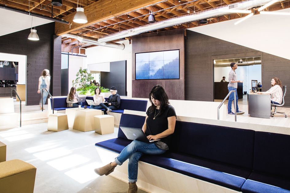 Swift Media Wall: The Colony group gathering space sits alongside a 9-screen  media wall for large group presentations, events and all-staff meetings.
