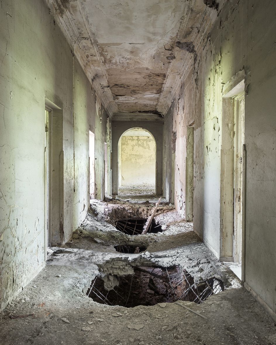 Concrete is starting to collapse inside this hallway connecting a theater with the main building. Tskaltubo, Georgia. © Reginald Van de Velde