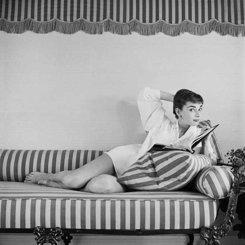 This photograph by Mark Shaw is an outtake from the cover of an international issue of LIFE magazine, first published 19th April, 1954. Audrey at Home on the Sun Lounger, 1954, Mark Shaw © Mark Shaw / mptvimages.com