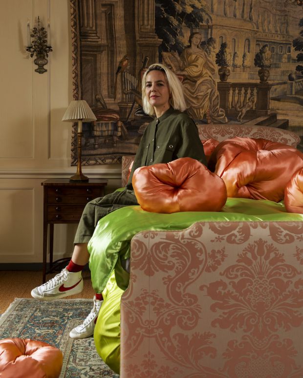 Designer Frith Kerr sitting on her seating installation at Fenton House. Photo credit: Oskar Proctor