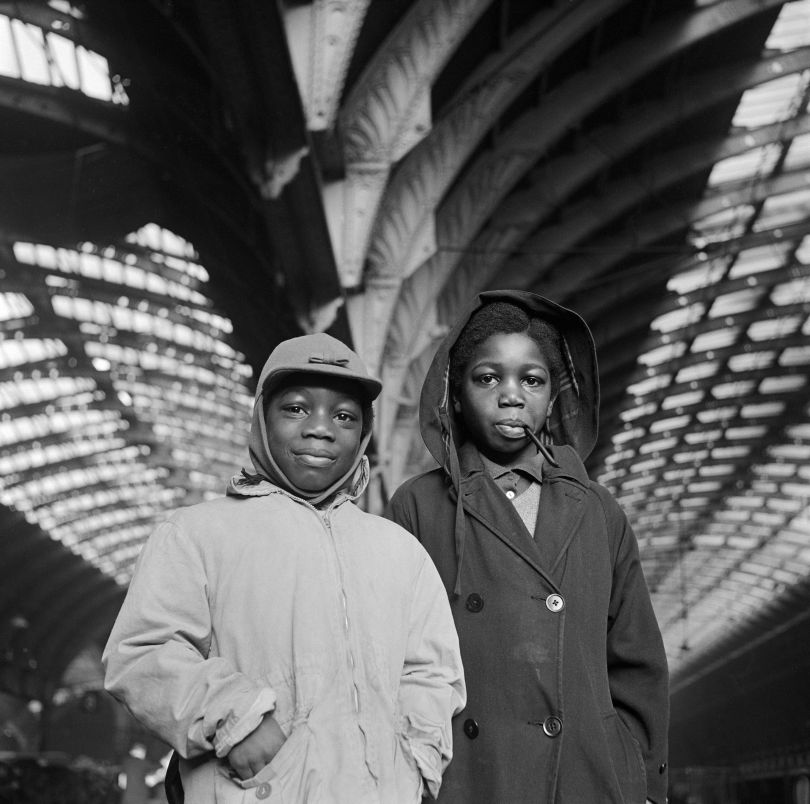Boys at Paddington Train Station, Copyright Historic England
