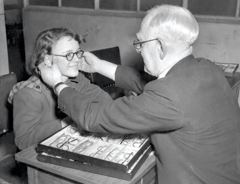 Patient being fitted for glasses at the Moorfields Eye Hospital in east London, 1950. The NHS boasted that many stylish frames were available