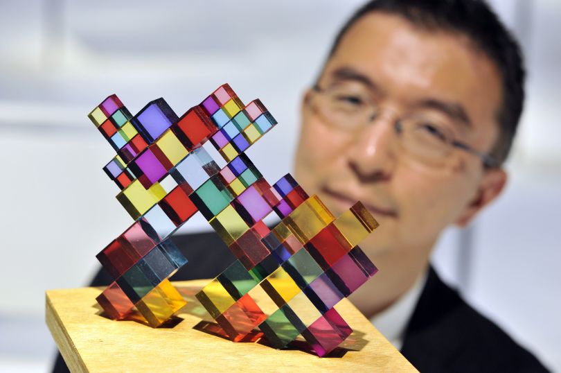 Sou Fujimoto, acclaimed Japanese architect, inspects Stacked Colours, one of 100 exhibits on display in his exhibition Futures of the Future at Japan House London