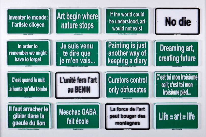 Meschac Gaba 16 plaques from Bibliotheque roulante, 2012. Copyright the artist Courtesy The Heong Gallery