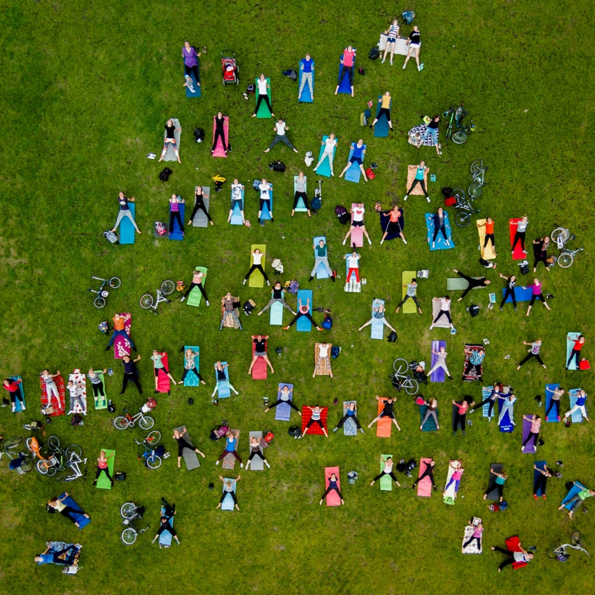 Open Air - Karolis Janulis: People on mass yoga exercise in the central park of Vilnius. (Open People)