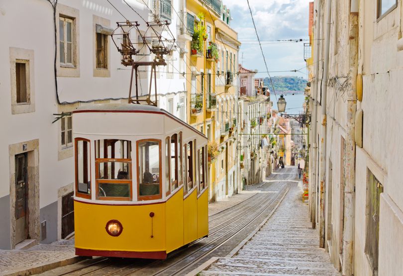 Lisbon's Gloria funicular connects downtown with Bairro Alto. Image licensed via Adobe Stock