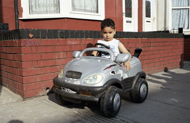 Mahtab Hussain Boy with BMW toy car  from the series You Get Me? 2009 Courtesy the artist