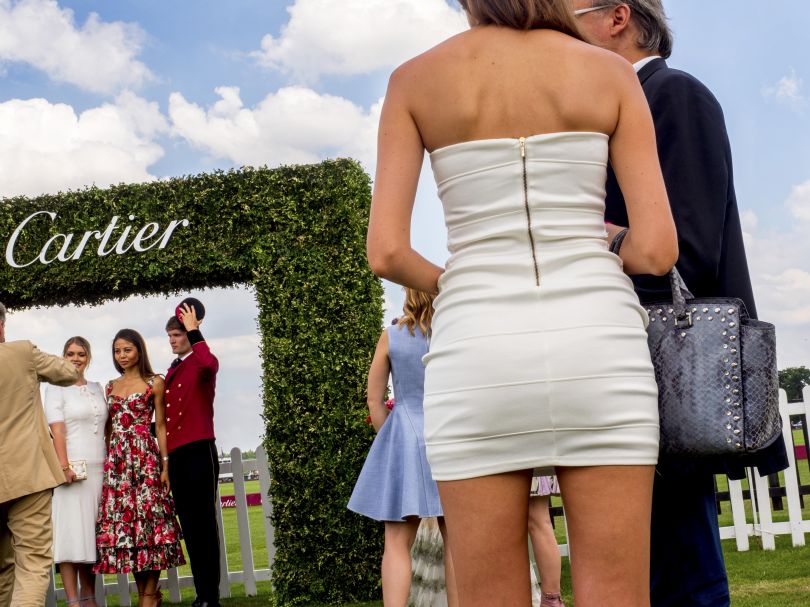 VIP guests socialise and in the Cartier marquee at the Queen's Cup Final played at the Guards Polo Club, Windsor Great Park. June 2017 © Peter Dench