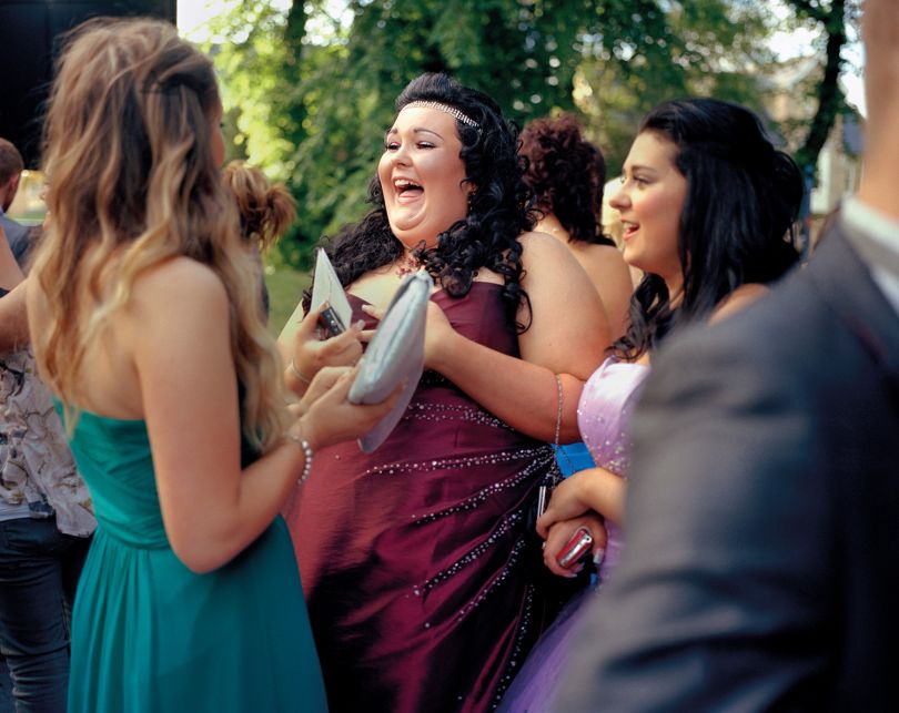 Shannon, age 15, laughing with friends at prom. Sheffield, 2012 © Abbie Trayler-Smith