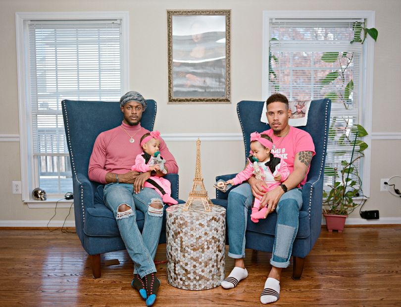Vernon and Ricardo with their twin girls at home. Clinton, Maryland © Bart Heynen from 'Dads' published by powerHouse Books