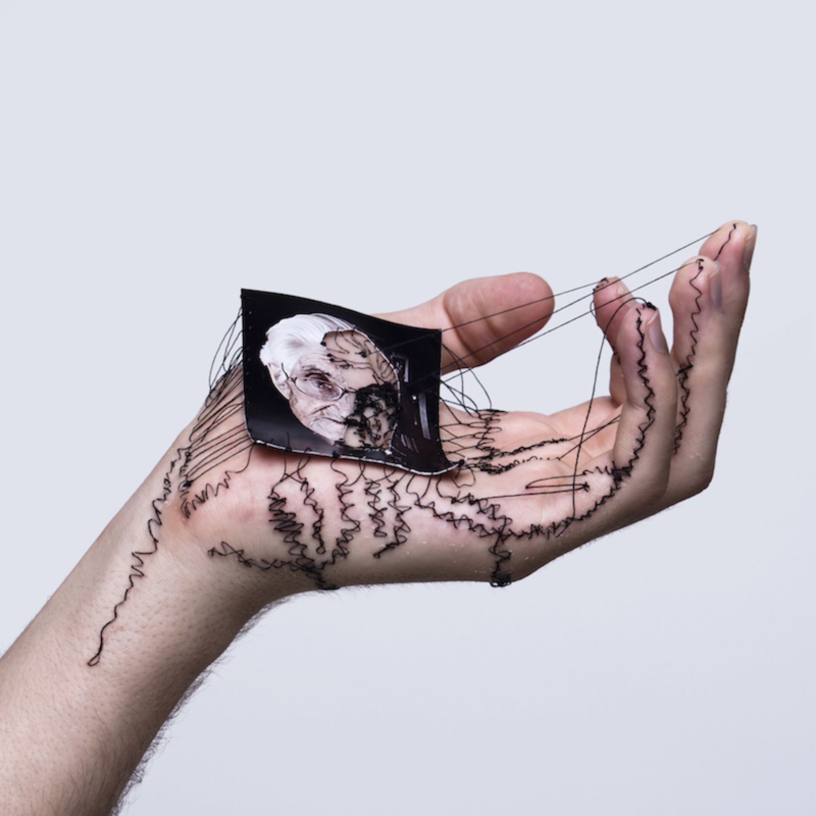 Handstitched portraits offer a painful slant on art Creative Boom