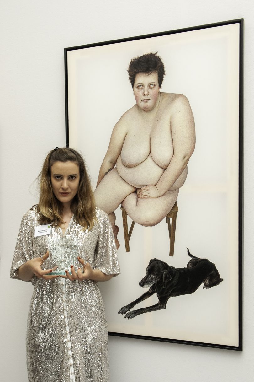 BP Young Artist Award Winner Emma Hopkins with her portrait Sophie and Carla. Photograph by Jorge Herrera