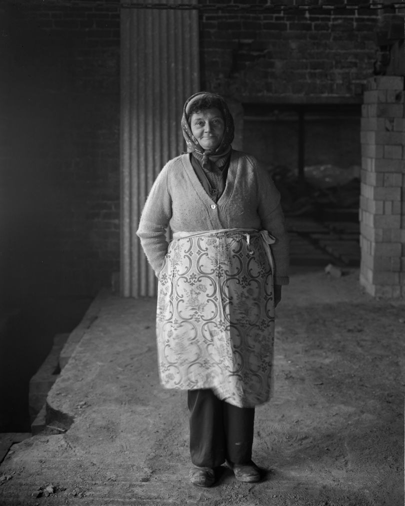Female brick worker standing, 1983 © John Myers courtesy RRB PhotoBooks