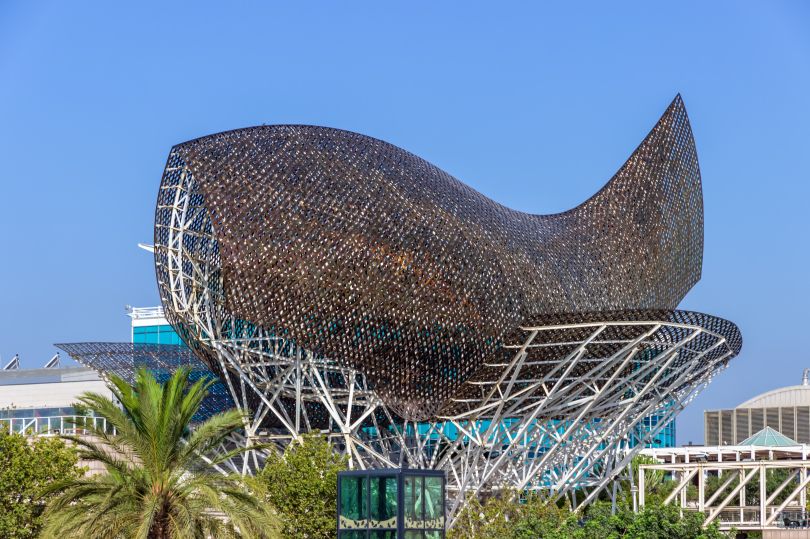 Sculpture 'El Peix' Fish of architect Frank Gehry, Port Olympic. Barcelona Spain. Image licensed via Adobe Stock / By Emoji Smileys People