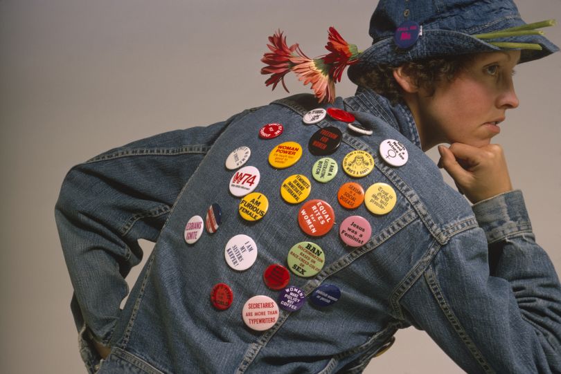 Feminist Buttons Decorate a Model’s Jean Jacket for an Article in Ms. in 1964 © Susan Wood