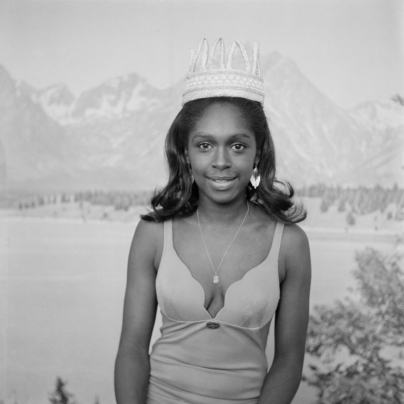 (unidentified) Beauty queen posing in front of alpine backdrop, London, 1970s. From the portfolio 'Black Beauty Pageants'. © Raphael Albert, courtesy Autograph ABP