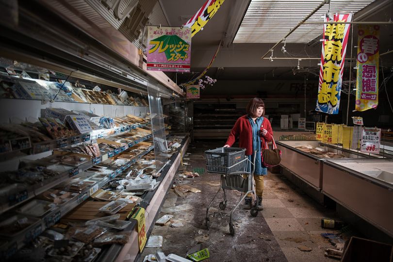 Midori Ito in an abandoned supermarket in Namie