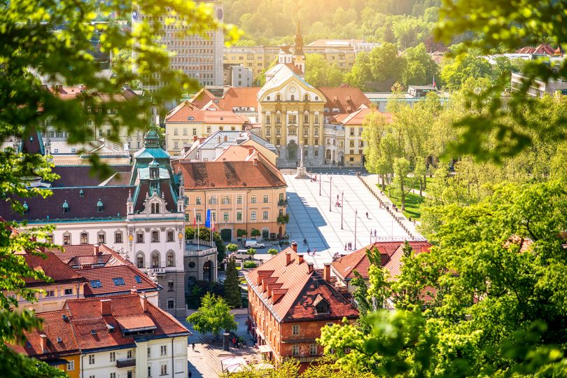Aerial cityscape view with Ursuline church of the Holy Trinity in Ljubljana. Image licensed via Adobe Stock