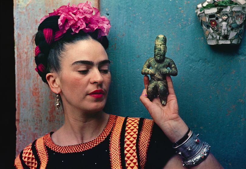 Frida Kahlo with Olmec figurine, 1939, photograph by Nickolas Muray © Nickolas Muray Photo Archives