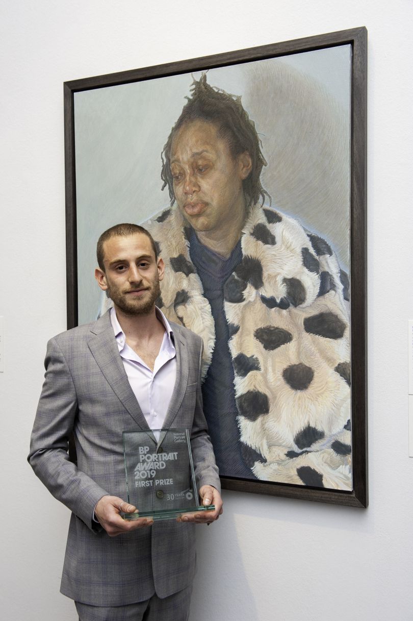 First Prize Winner Charlie Schaffer with his portrait Imara in her Winter Coat. Photograph by Jorge Herrera
