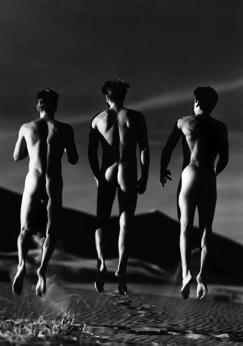 Three Boys Jumping, Kelso Dunes, 1991. © Gre
