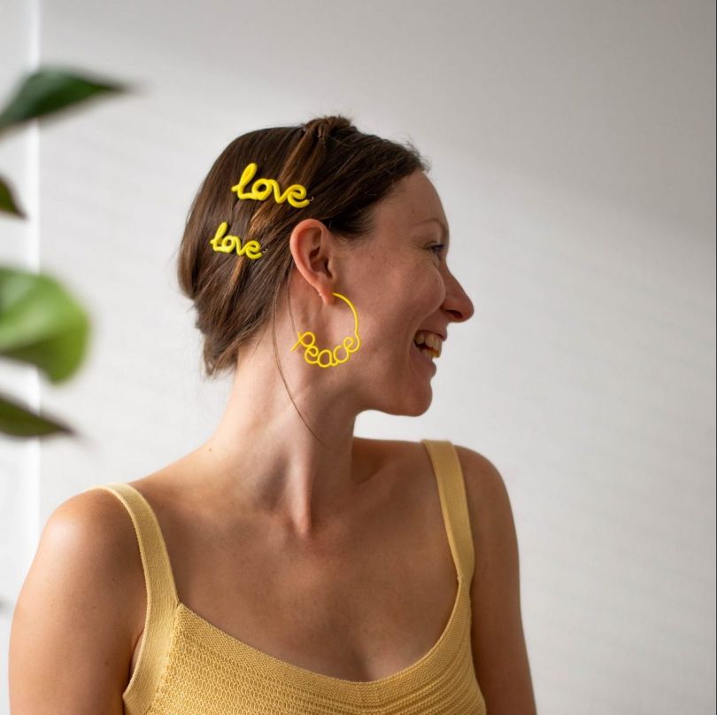 'Peace' earrings £75, 'Love' Hair Clip from £32 by [Zoe Sherwood](https://www.zoesherwood.co.uk/product/love-hair-clip/)