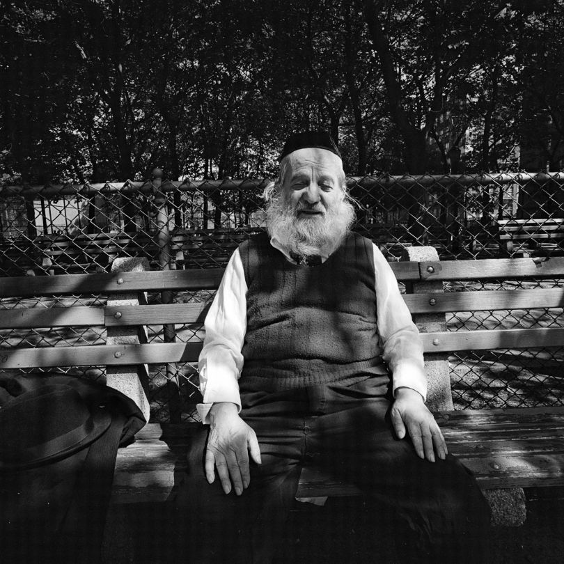 White Bearded Man on Park Bench in Dappled Sunlight, NY, May 1977 © Meryl Meisler