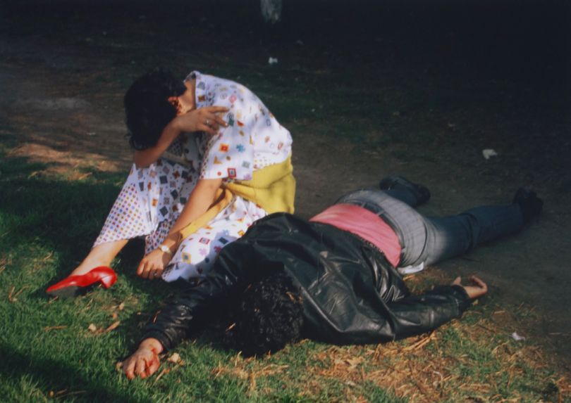 A woman grieves over her dead boyfriend, stabbed in Chapultepec Park while resisting robbers, Mexico City, 1995 © Enrique Metinides. Courtesy of Michael Hoppen Gallery