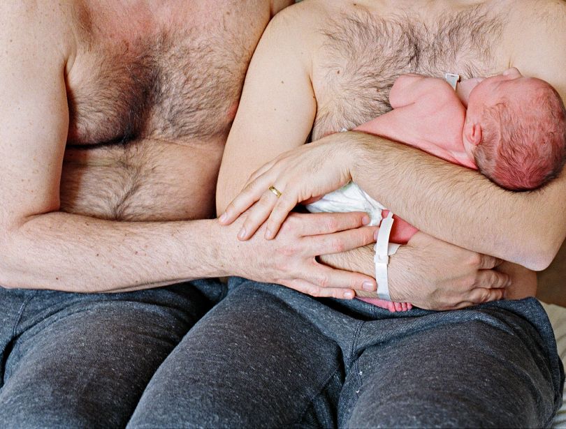 Txema and Pablo and their newborn son on the morning of his birth. Monticello, Minnesota © Bart Heynen from 'Dads' published by powerHouse Books