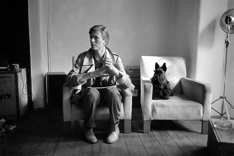 Seated Bowie with Dog by Brian Duffy courtesy of The Duffy Archive to exhibit at Art for Cure 2018 in aid of Breast Cancer Now. © Duffy courtesy of The Duffy Archive