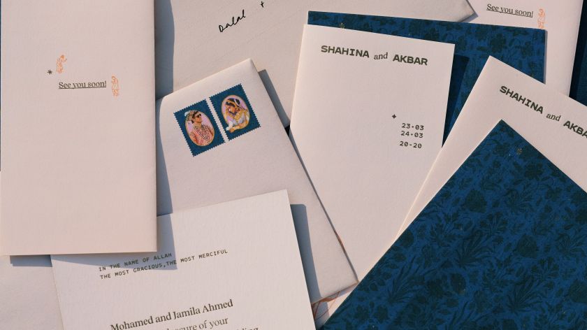 Wedding invites inspired by Mughal miniature paintings and Pulp Fiction