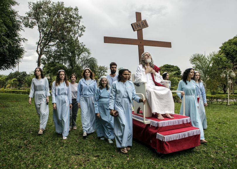 INRI Cristo is wheeled around their compound on a rolling pedestal. INRI are the initials that Pontius Pilate had written on top of Jesus' cross, meaning Jesus Christ, King of the Jews. Brazil, 2014 | © Jonas Bendiksen/ Magnum Photos
